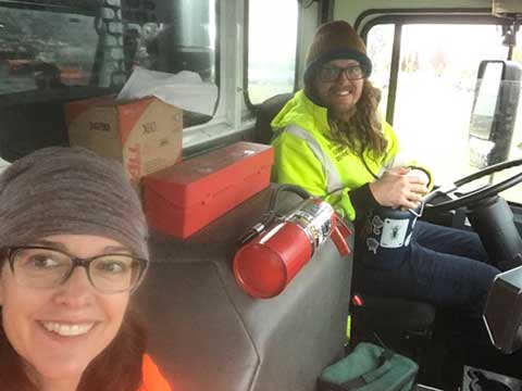 Jill and Alex in the recycling truck