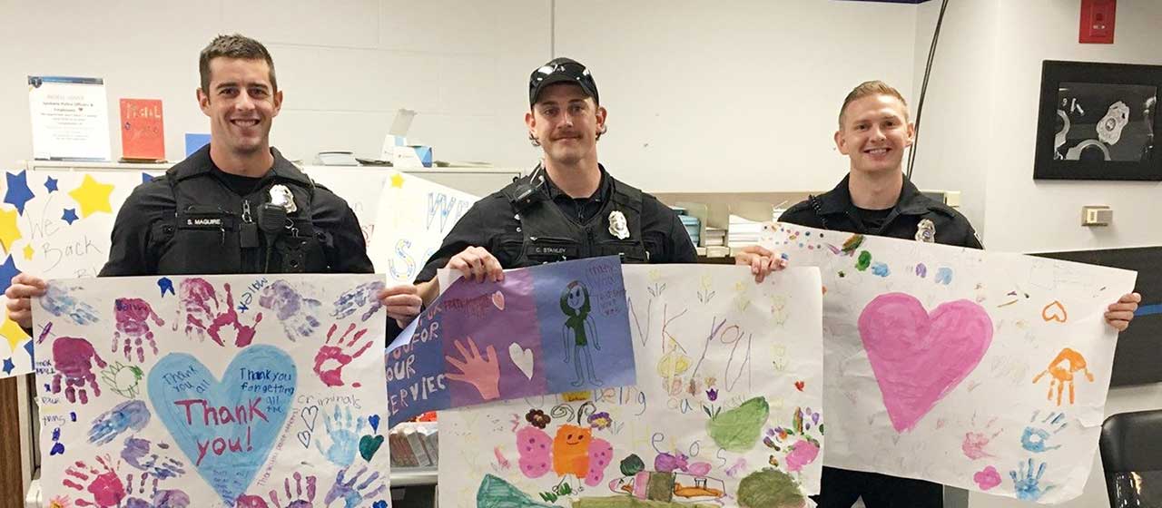 SPD Officers and Thank You Posters