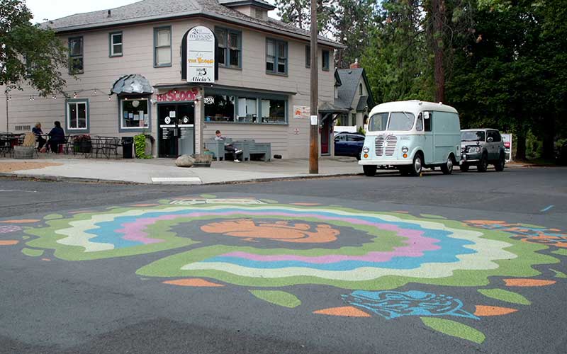 Asphalt mural at the intersection of 25th and Monroe in the Manito-Cannon Hill neighborhood