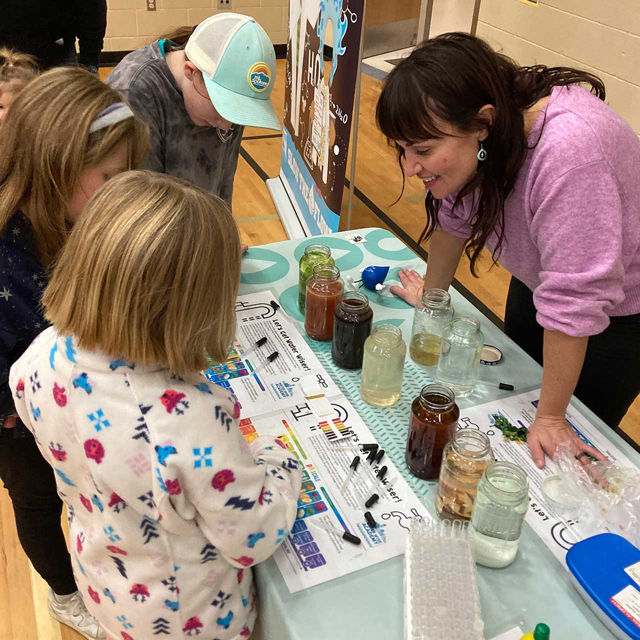 Kids at water education booth